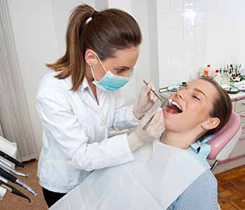 A dentist caring about patient's teeth